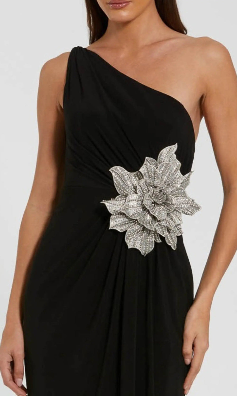 Mac Duggal 11849 black detail view of oversized 3D beaded floral appliqué at hip, stretch jersey evening gown, red carpet styling