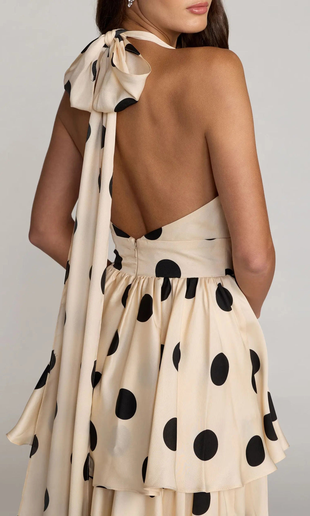 Mac Duggal 27833 Black Ivory prom gown detail-back view of open back halter tie and tiered ruffle skirt layers, gala event dress detail