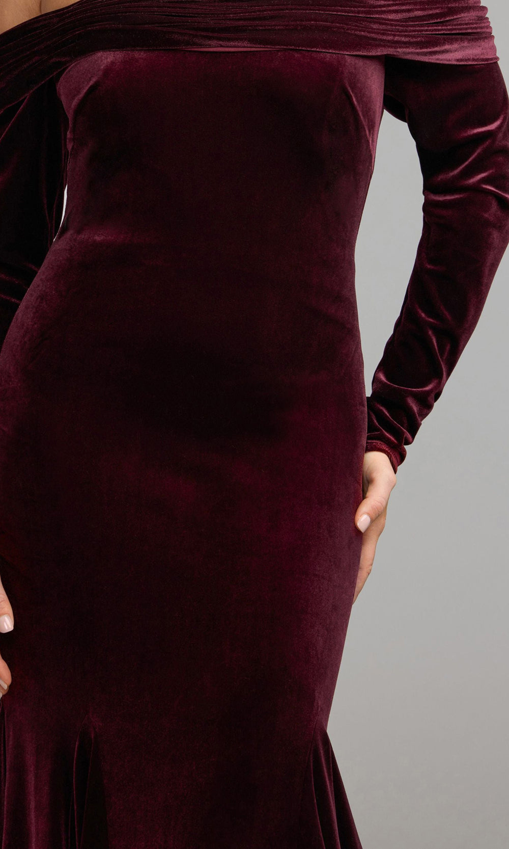 Mac Duggal 56476 wine velvet off-shoulder neckline detail view showing folded bust band drape, long-sleeve evening gown for gala