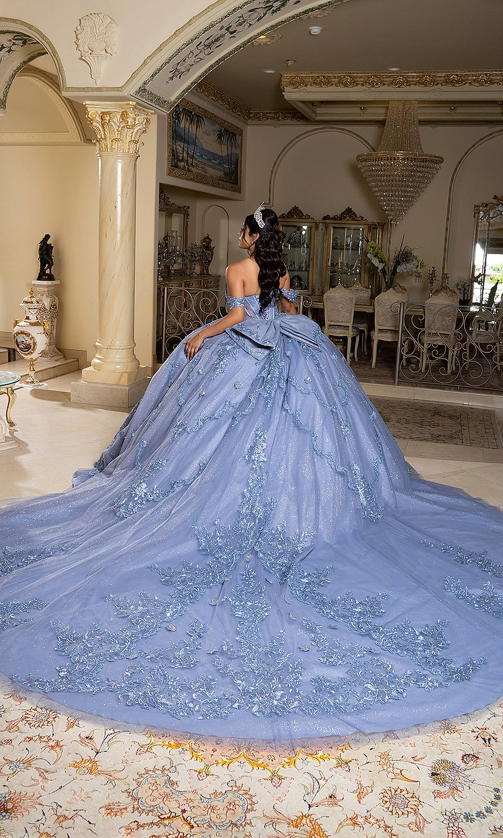 May Queen LK283 dusty blue quinceañera gown — back view of the voluminous skirt and long train