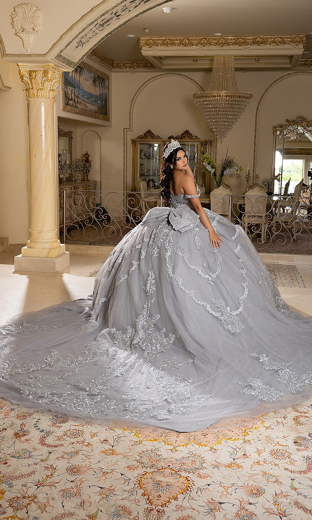 May Queen LK283 silver quinceañera ball gown — back view of the full glitter skirt and sweeping train