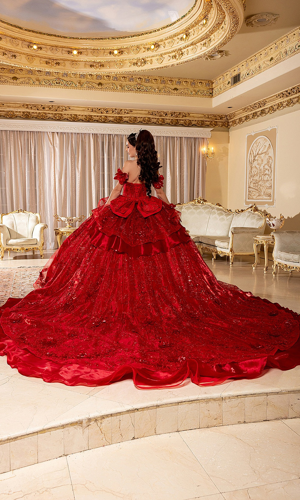 May Queen LK295 red ball gown — side view of the tiered ruffle quinceañera skirt and sweeping train