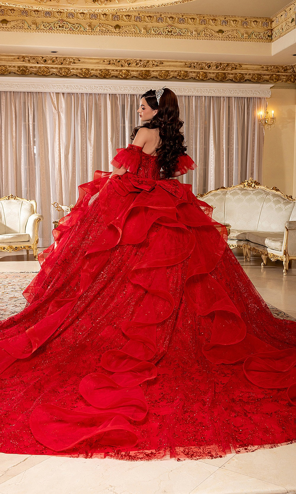 May Queen LK296 red quinceañera gown — back view of the cascading ruffle skirt and sweeping train