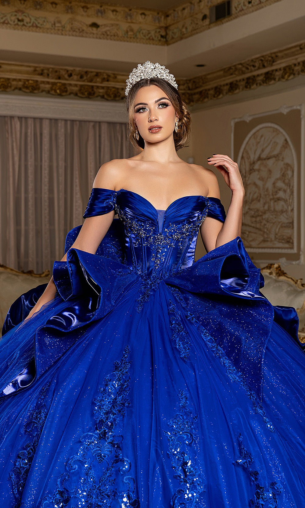 May Queen LK297 royal blue quinceañera gown — three-quarter view of the bodice and oversized back bow