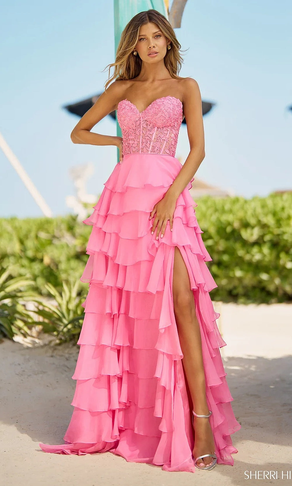 Sherri Hill 56162 Bright Pink front full-length view strapless sweetheart boned corset lace embroidery tiered ruffle skirt prom gown red carpet styling