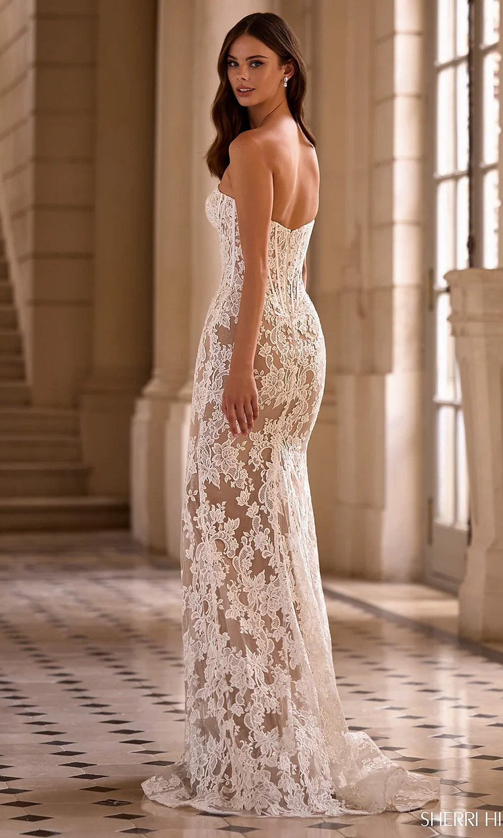 Sherri Hill 57685 Ivory champagne beige side view prom gown with fitted lace over mesh construction, boned sweetheart bodice and sweep train, evening gown