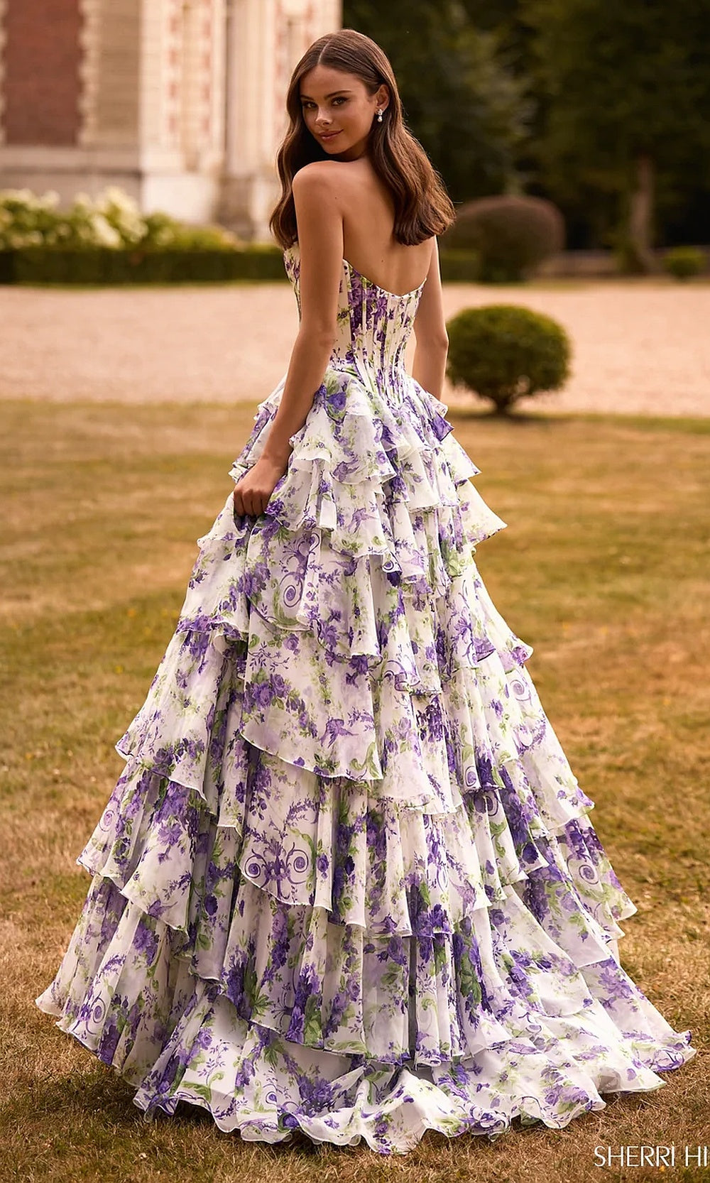 Sherri Hill 57692 Ivory Purple Green Print prom dress back view showing open corset back tiered ruffle ballgown skirt sweep train floral chiffon evening gown