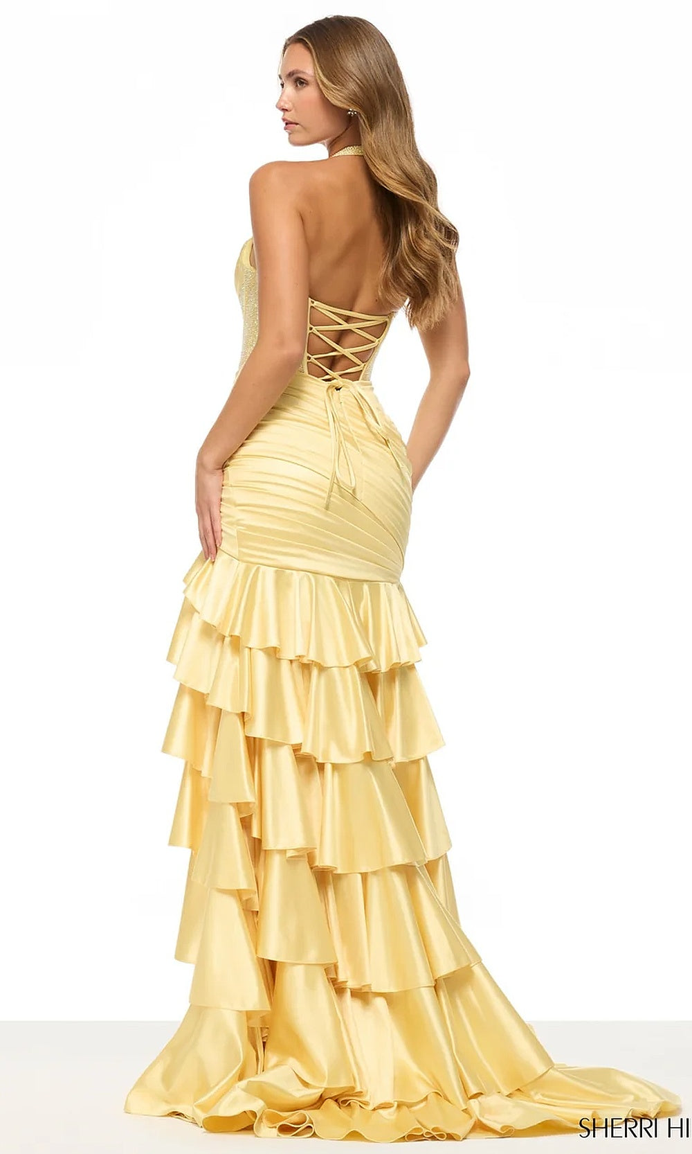 Sherri Hill 57702 Yellow prom gown back view with full open crisscross lace-up back, tiered ruffle skirt train, evening gown styling
