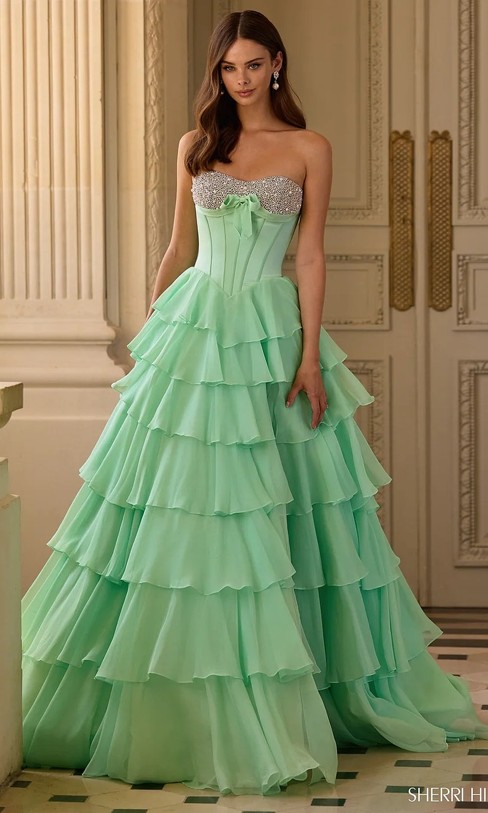 Sherri Hill 57799 Light Green prom dress full view with dramatic ballgown silhouette, multi-tiered ruffle skirt, beaded bodice, red carpet styling