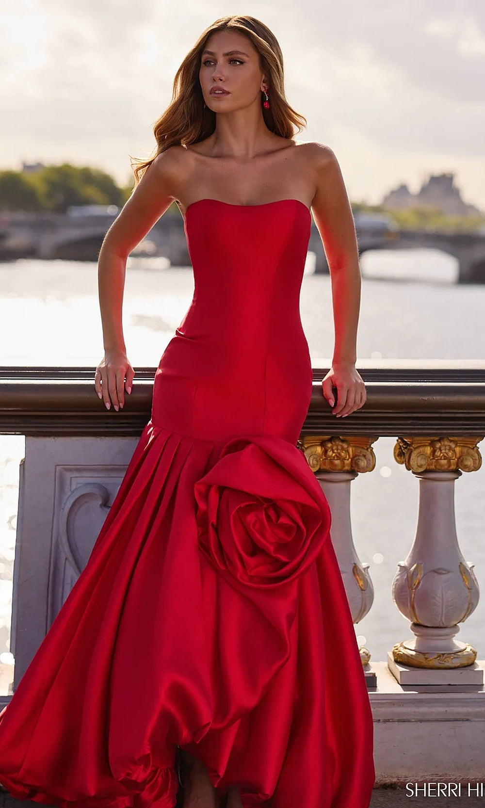 Sherri Hill 57845 Red prom gown second front view, strapless scoop neckline, fitted satin mermaid bodice with dramatic flared skirt, red carpet styling