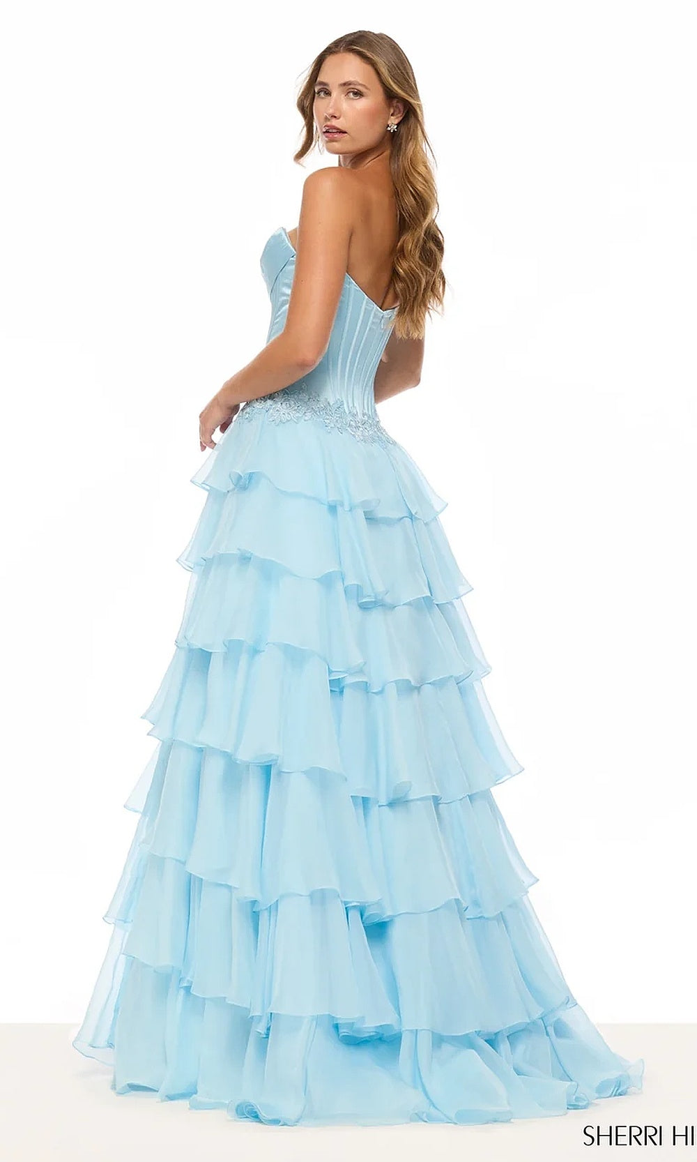 Sherri Hill 57868 Light Blue prom ballgown back view with lace-up corset back, multi-layer chiffon train, structured satin bodice, red carpet styling