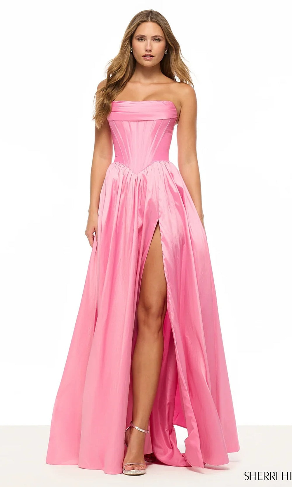 Sherri Hill 57870 Bright Pink prom dress front view with strapless scoop neckline, full ballgown silhouette, high slit, red carpet styling prom gown
