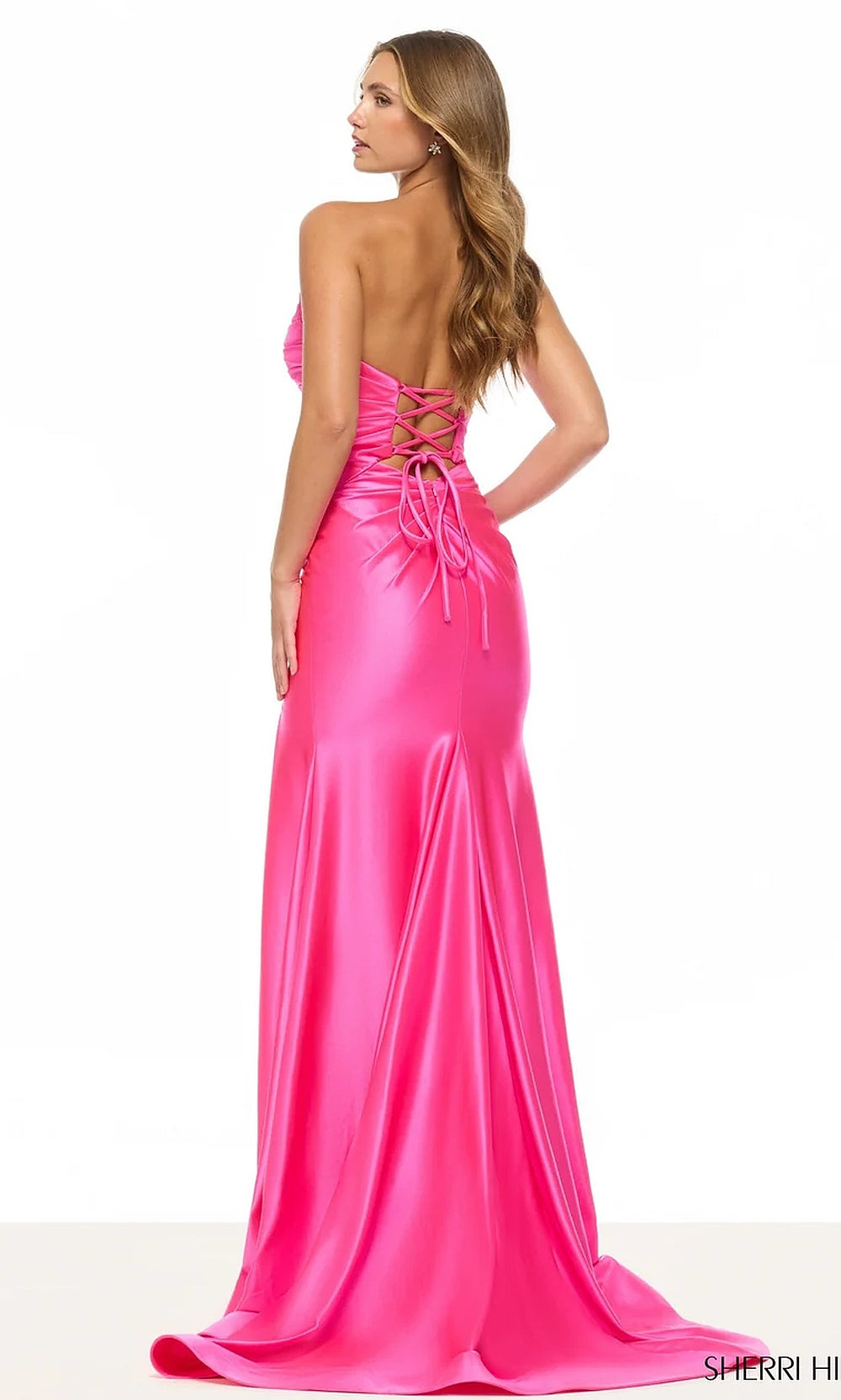Sherri Hill 57882 Bright Fuchsia prom gown back view with open crisscross lace-up back, fitted satin silhouette, floor-length train, sleek-and-sleek formal dress