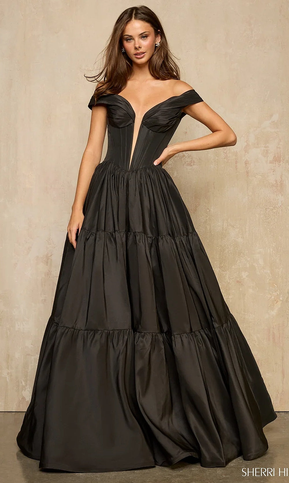 Sherri Hill 57945 Black prom ballgown with structured satin fabric, off-shoulder sweetheart corset bodice and tiered ruffle skirt, front view, formal prom gown