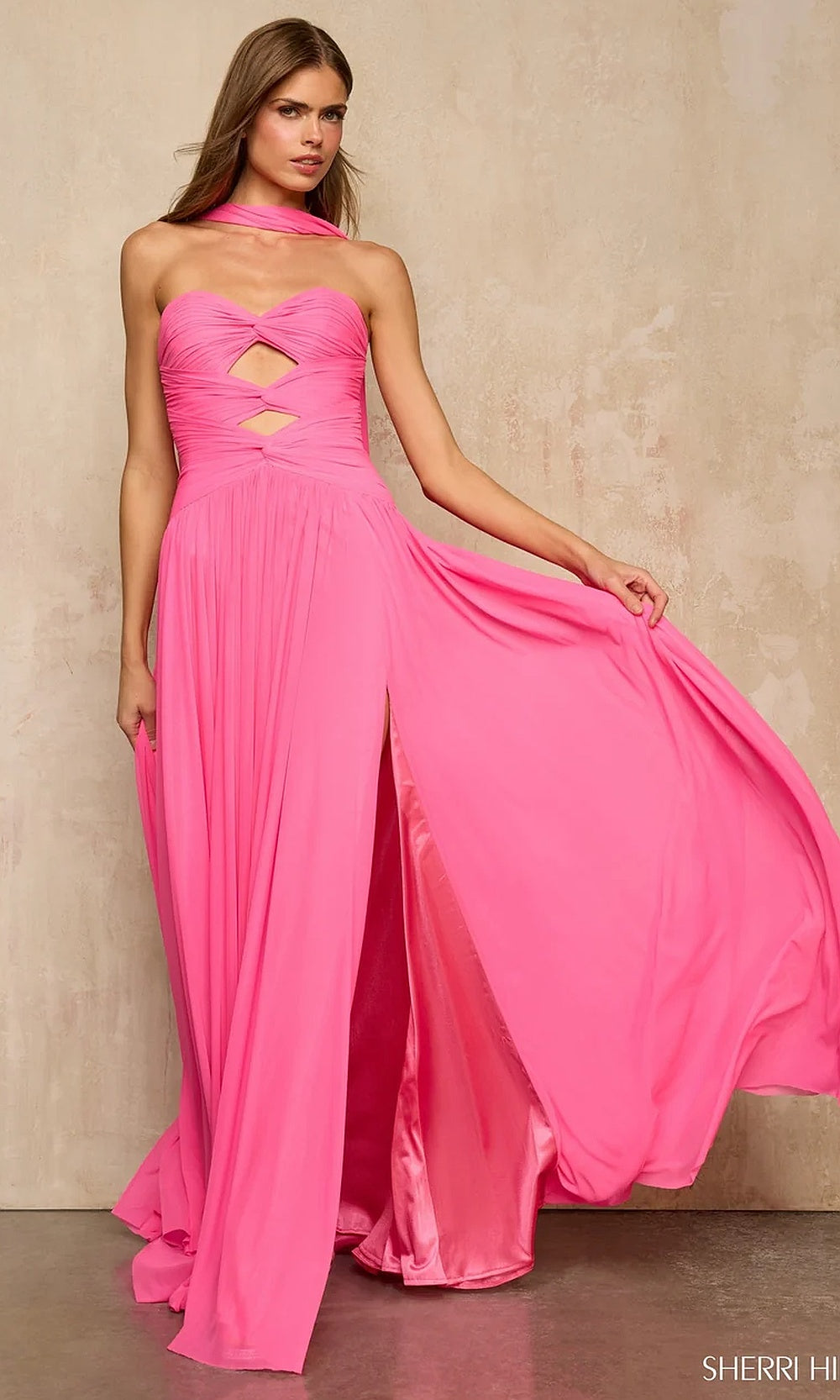 Sherri Hill 57951 Bright Pink prom gown in chiffon with halter sweetheart neckline, ruched bodice, open back, and front high slit, front view, formal prom gown