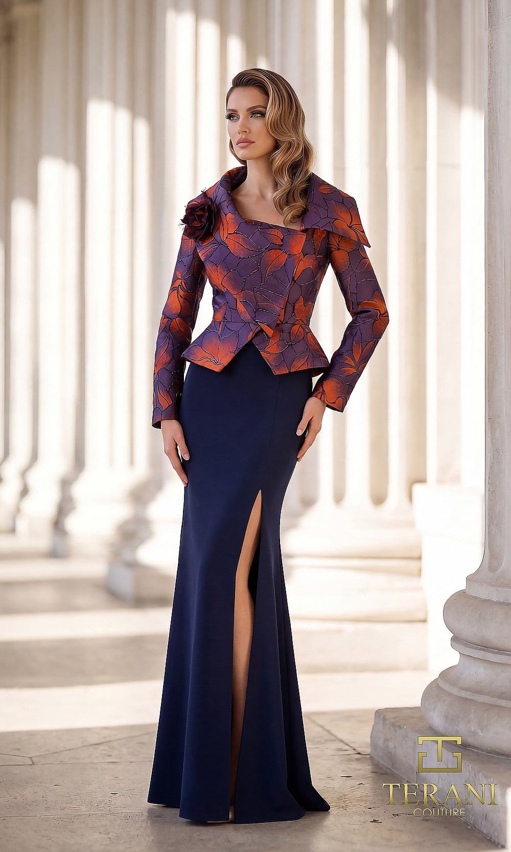 Terani Couture 262E7090 Navy Multi formal evening dress front view with printed jacquard long-sleeve jacket with portrait collar and rosette, navy crepe column gown with slit, black tie event dress
