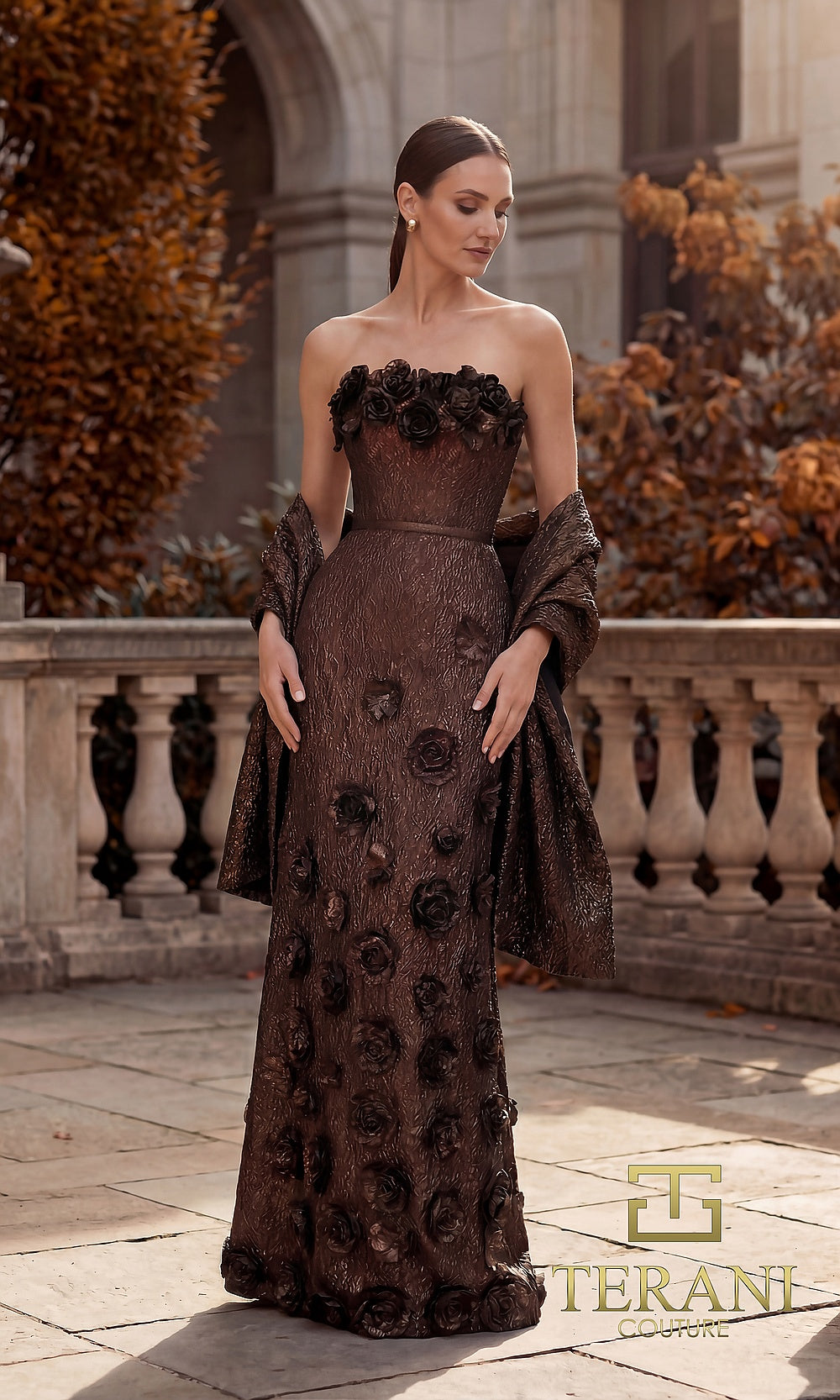 Terani Couture 262E7093 Bronze formal evening dress front view with strapless metallic brocade column with 3D rosette appliqués and rosette neckline, matching wrap, black tie event dress