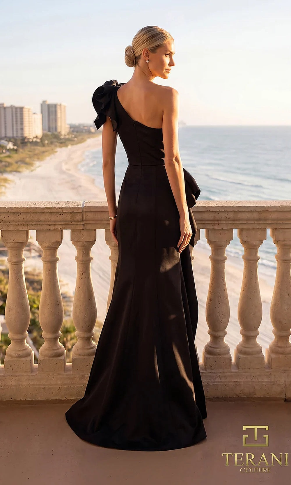 Terani Couture 262E7132 Black formal evening dress back view with one-shoulder ruffle bow, crepe fitted mermaid with back bow, gala gown