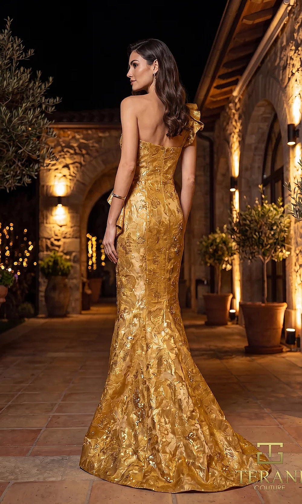 Terani Couture 262E7136 Gold formal evening dress back view with one-shoulder metallic jacquard mermaid, sweep train, gala gown