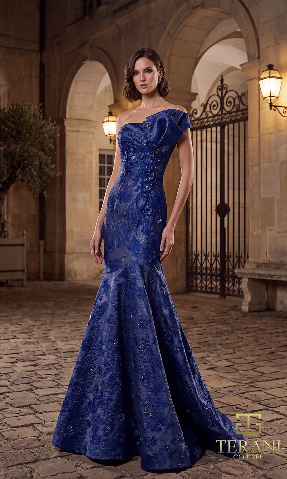 Terani Couture 262E7137 Midnight formal evening dress front view with asymmetric one-shoulder draped neckline, metallic brocade jacquard mermaid, gala gown