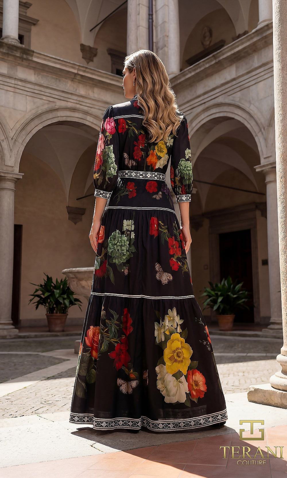Terani Couture 262E7508 Black Multi formal evening kaftan dress back view with floral print kaftan maxi, embroidered trim tiers, belted waist, gala gown