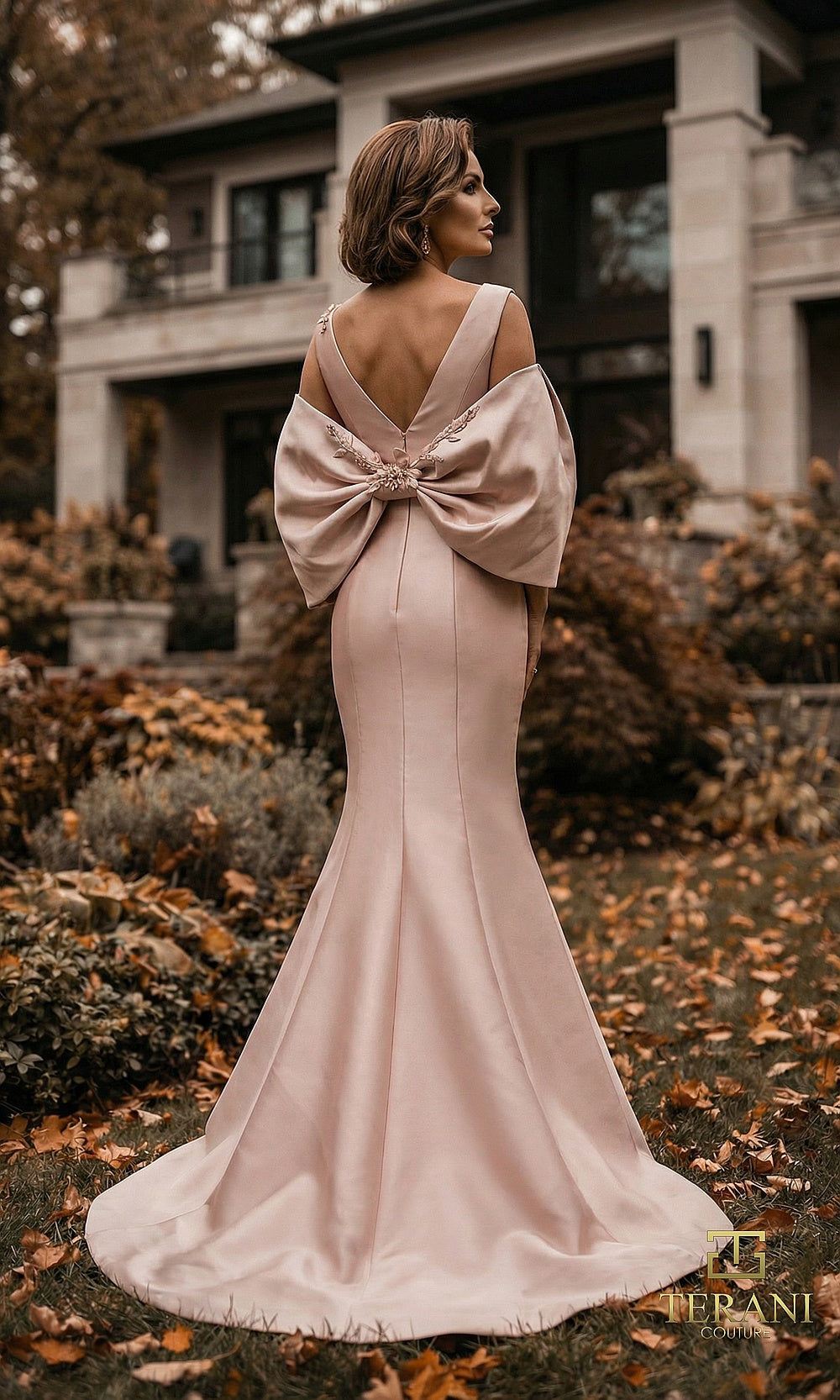 Terani Couture 262M7253 Rose mother of the bride dress back view with V-back with oversized sculpted bow, mikado mermaid with sweep train, formal wedding celebration dress