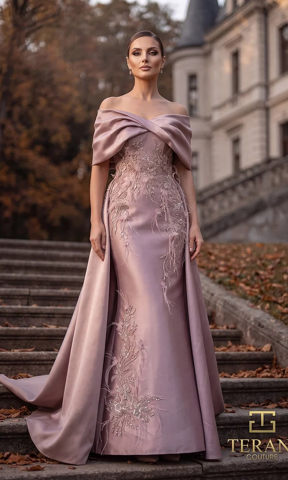 Terani Couture 262M7271 Mauve mother of the bride dress front view with off-shoulder draped neckline, beaded embroidered satin column with sweeping overskirt, mother of the bride styling