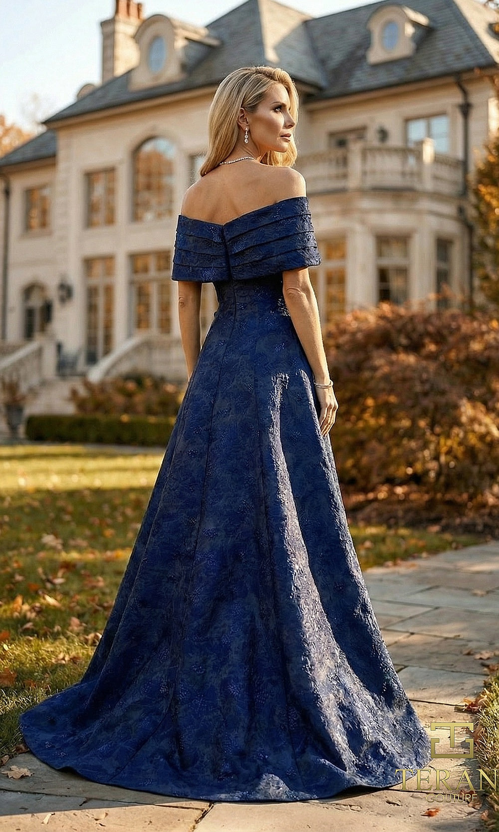 Terani Couture 262M7299 Midnight mother of the bride dress back view with off-shoulder folded, jacquard A-line, formal wedding celebration dress