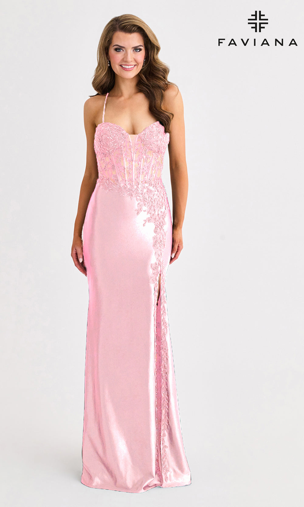 Woman wearing a pink sequin dress with Faviana branding on a white background