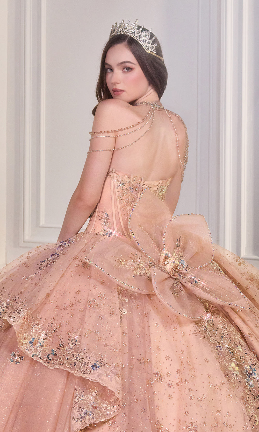 Ladivine 15727 Rose Gold Beaded Tulle Ballgown Back Detail with criss cross back and big flower bow.