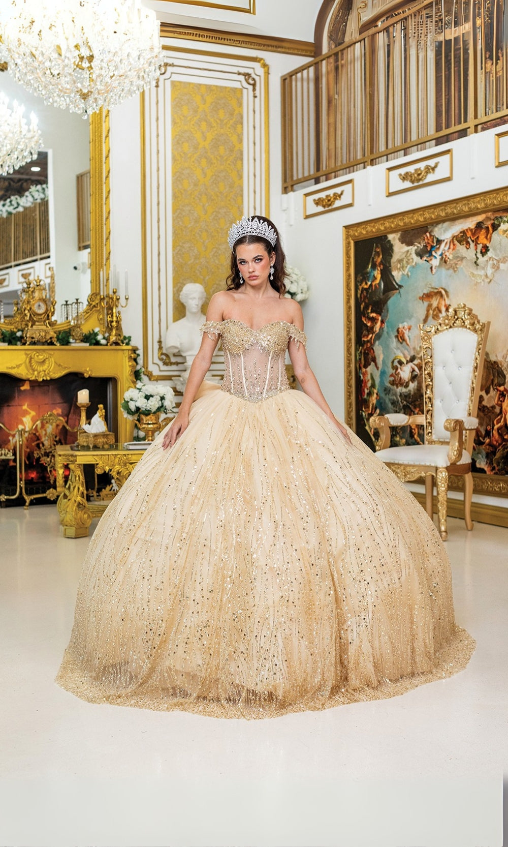 Woman in a gold gown standing in an opulent room with decorative elements.