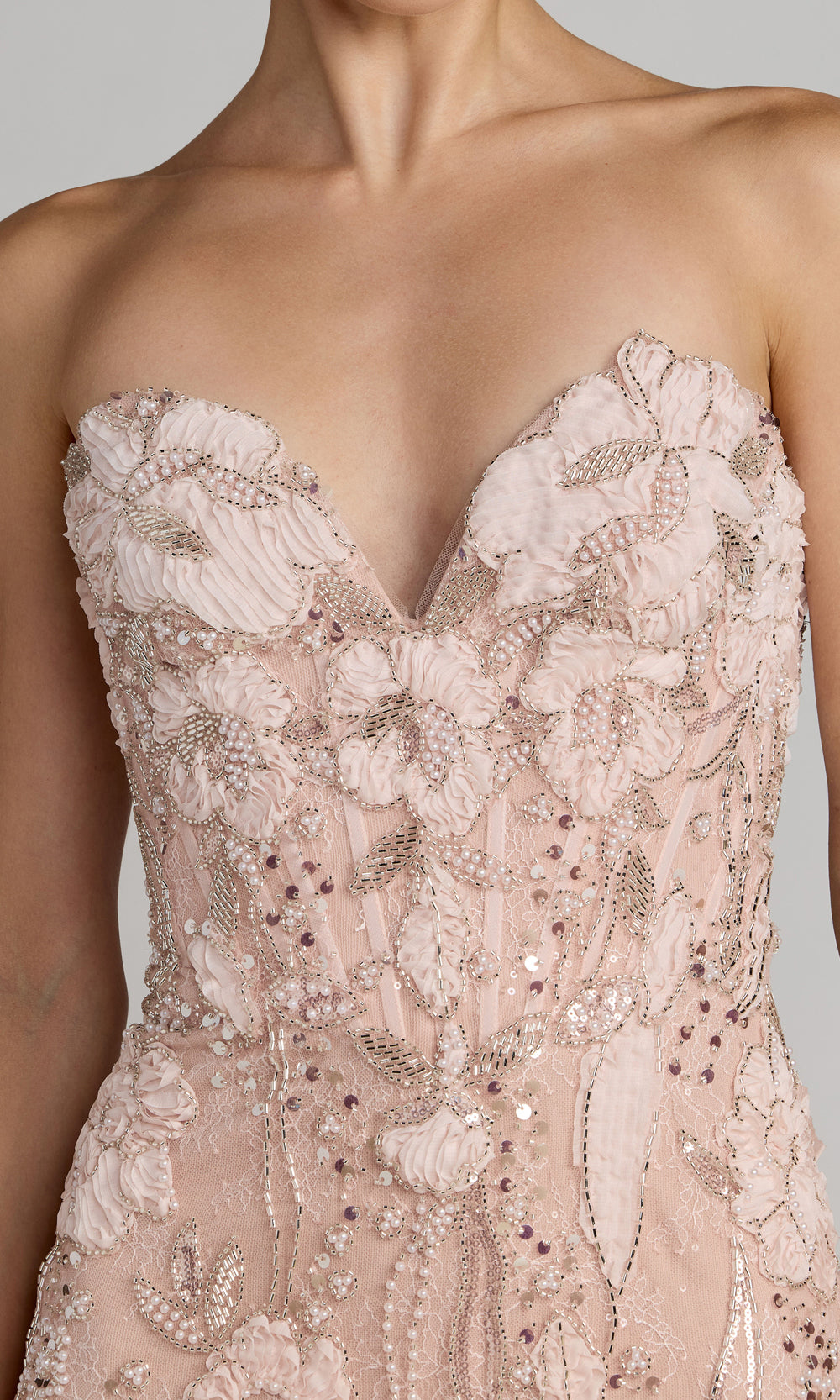 Mac Duggal 21283 blush pink prom gown detail view, pearl and bead embroidery on 3D floral appliqués, lace mesh surface, strapless fitted bodice, red carpet styling