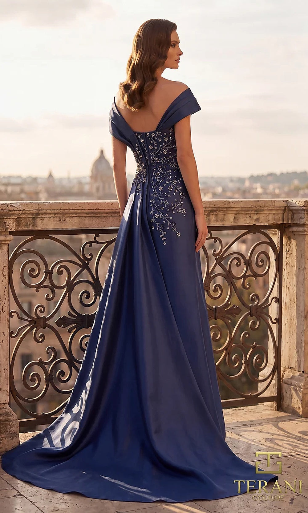 Terani Couture 262M7258 navy blue back view off-shoulder beaded satin evening gown with draped collar, high covered back, and cathedral train, black tie event dress styled for mother-of-the-bride