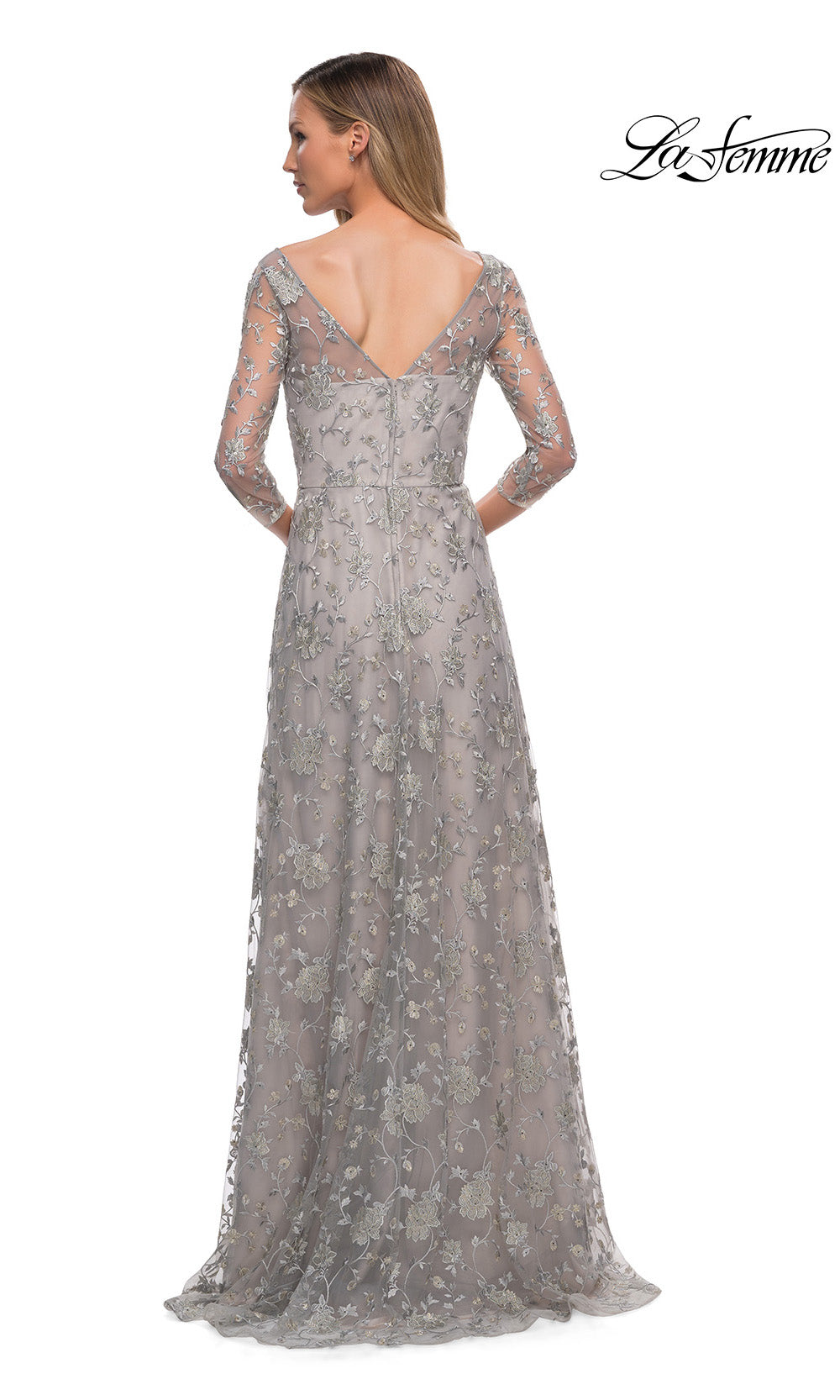 Silver lace evening gown with long sleeves on a white background