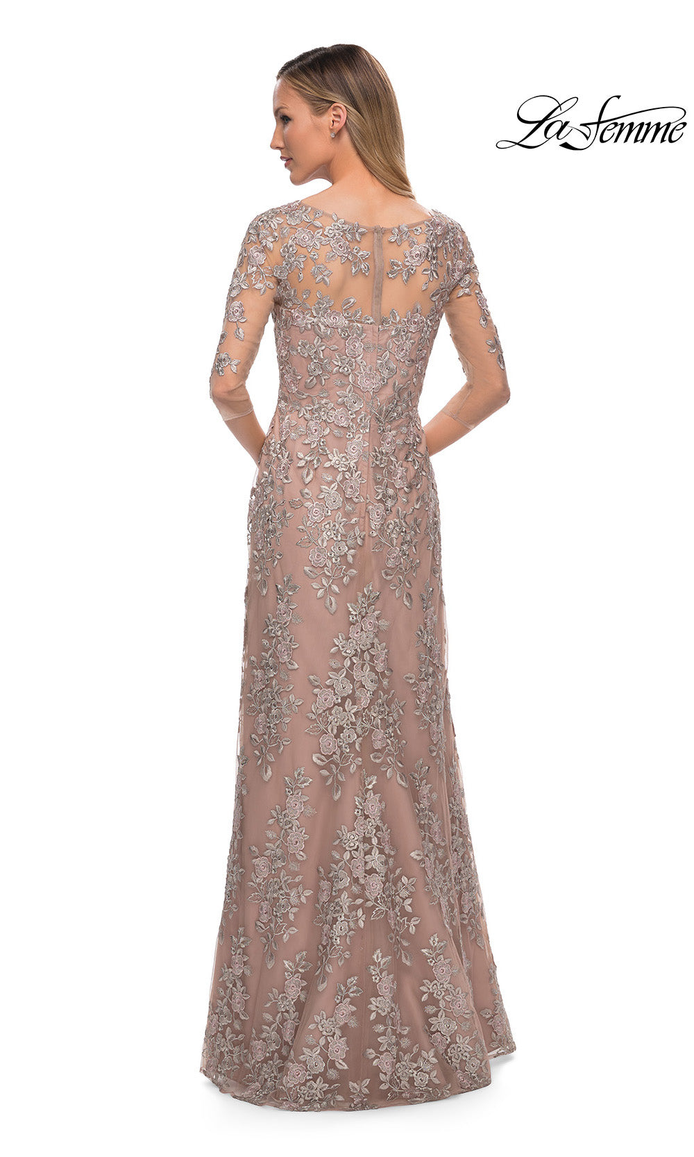 Elegant evening gown with lace detailing on a white background