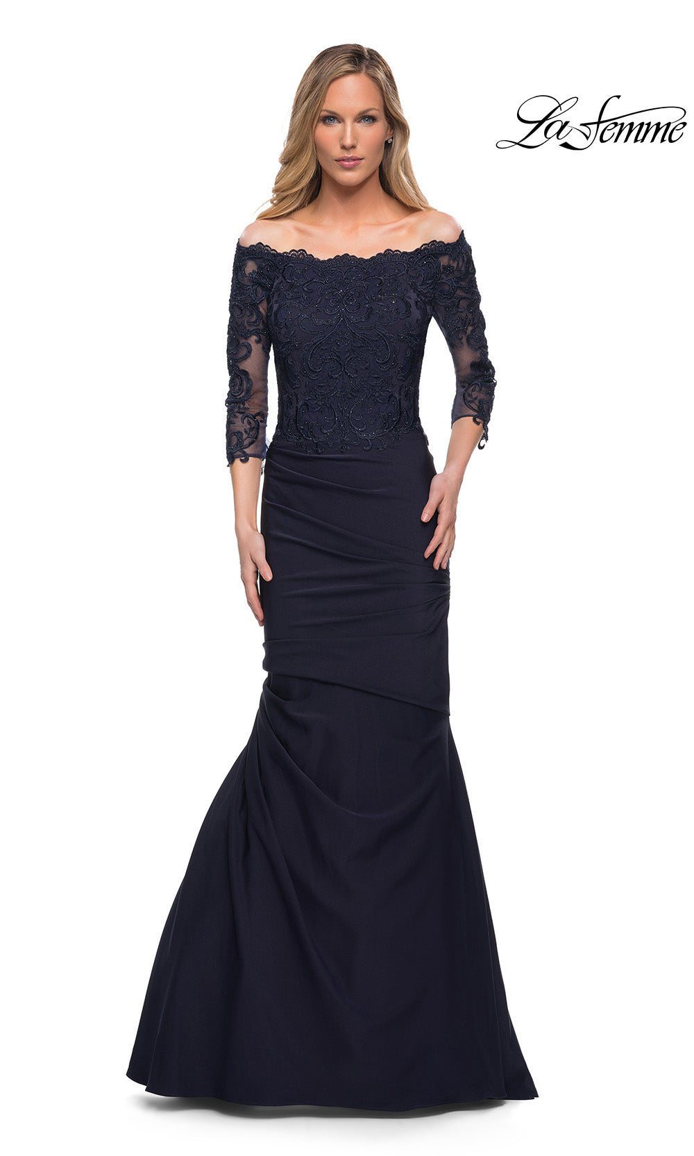 Navy blue evening gown with lace sleeves on a white background