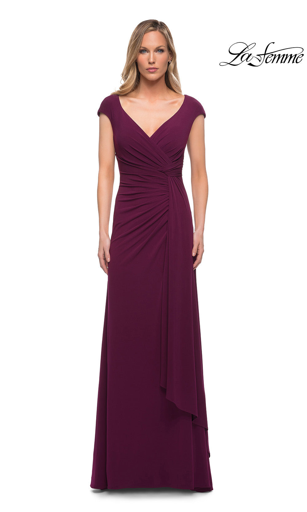 Woman wearing a purple evening gown on a white background with 'La Femme' branding.