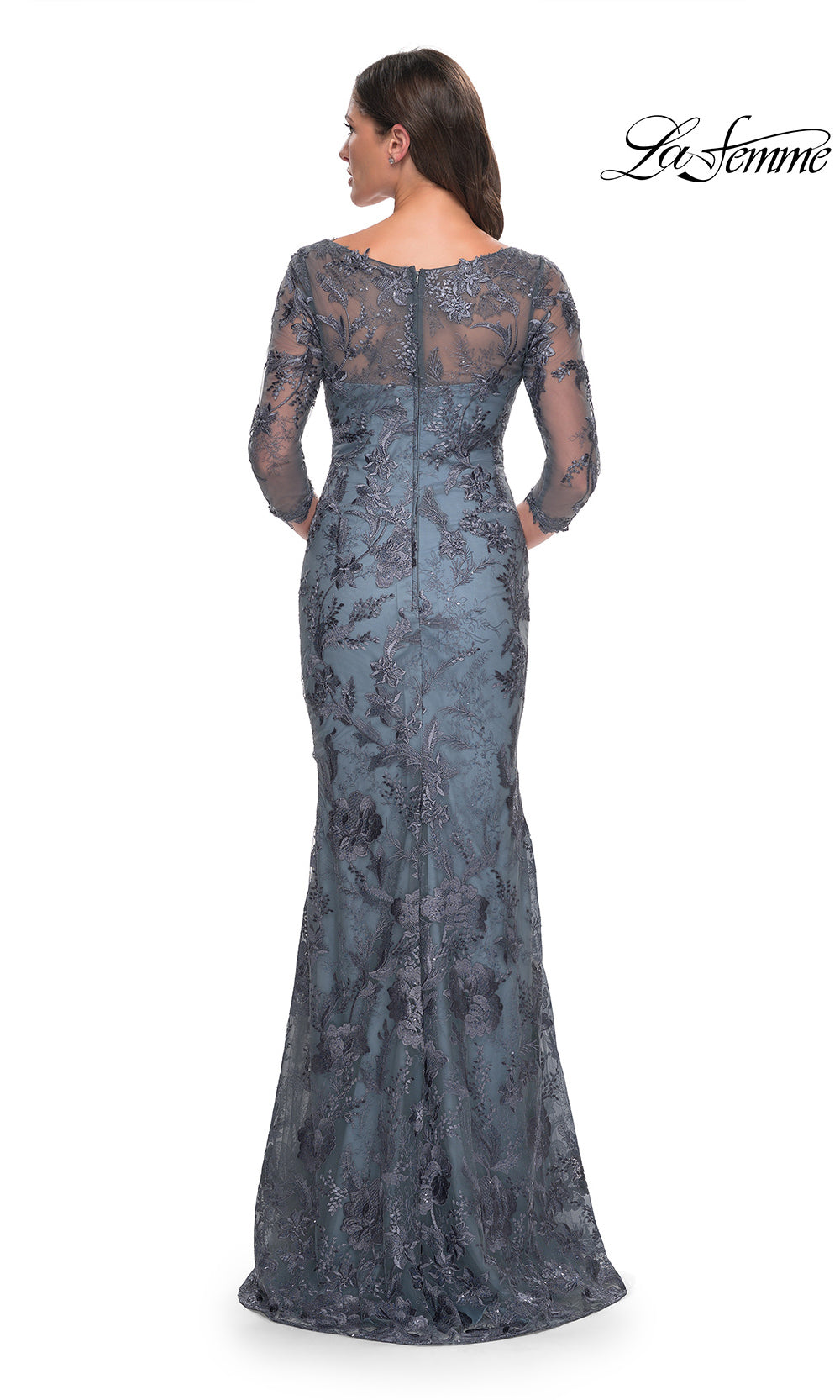 Long lace dress with sheer sleeves on a white background, brand 'La Femme' visible.