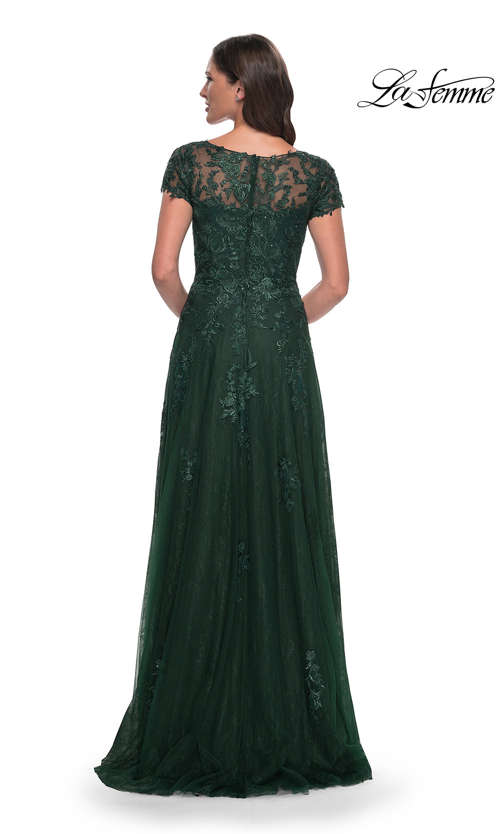 Green evening gown with lace detailing on a white background