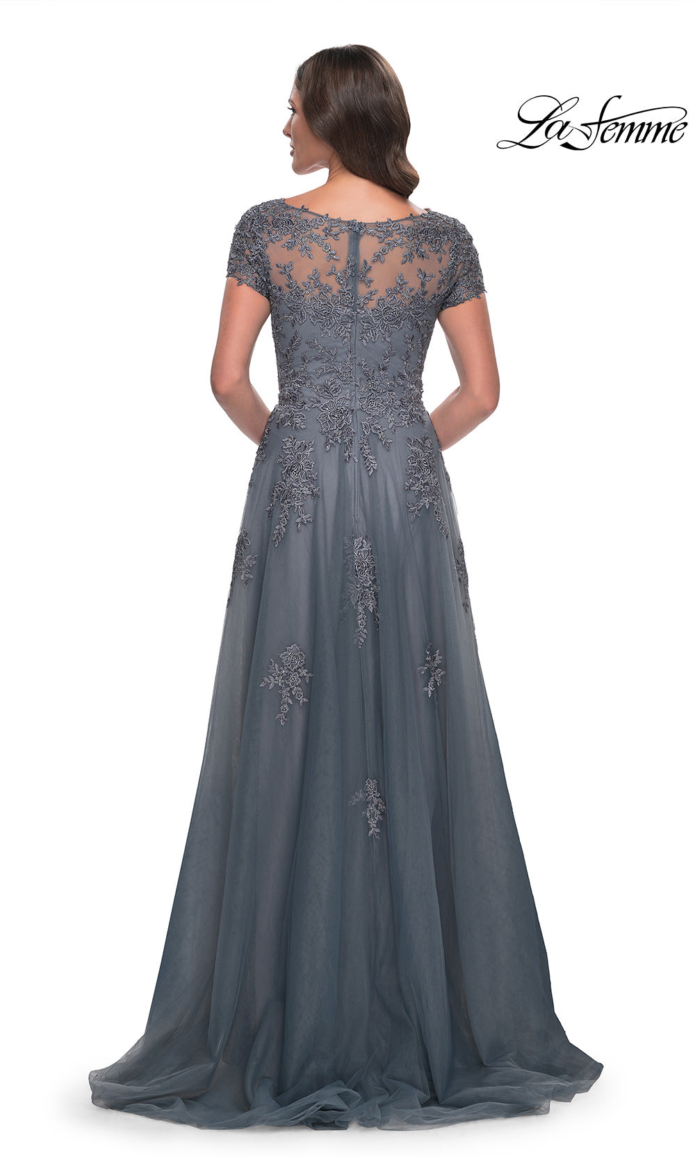 Long gray evening gown with lace detailing on a white background