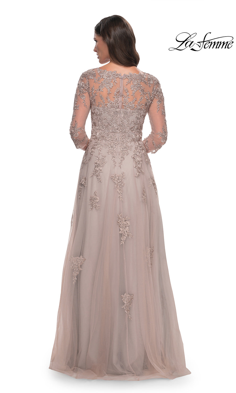 Elegant evening gown with intricate lace detailing on a white background