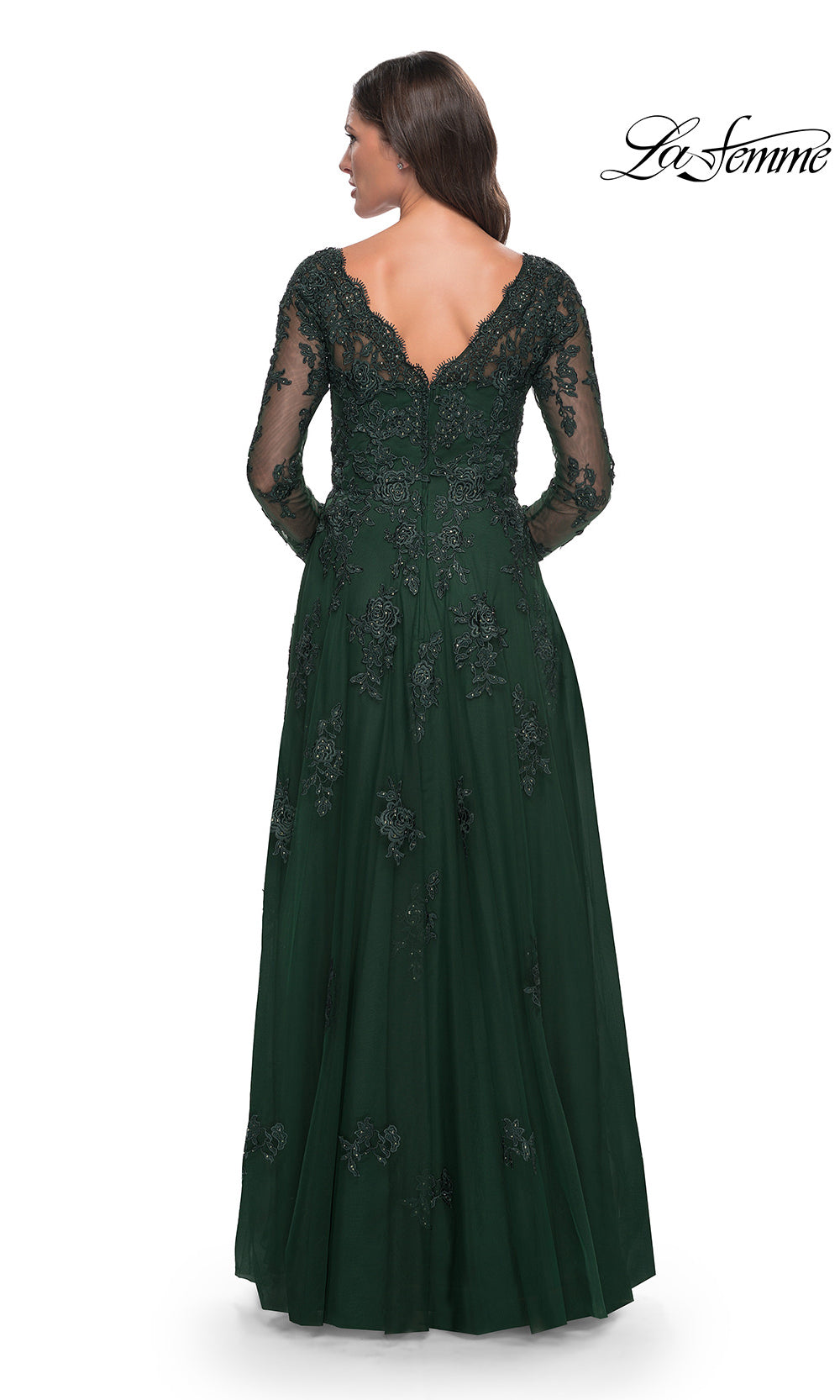 Green evening gown with lace detailing on a white background