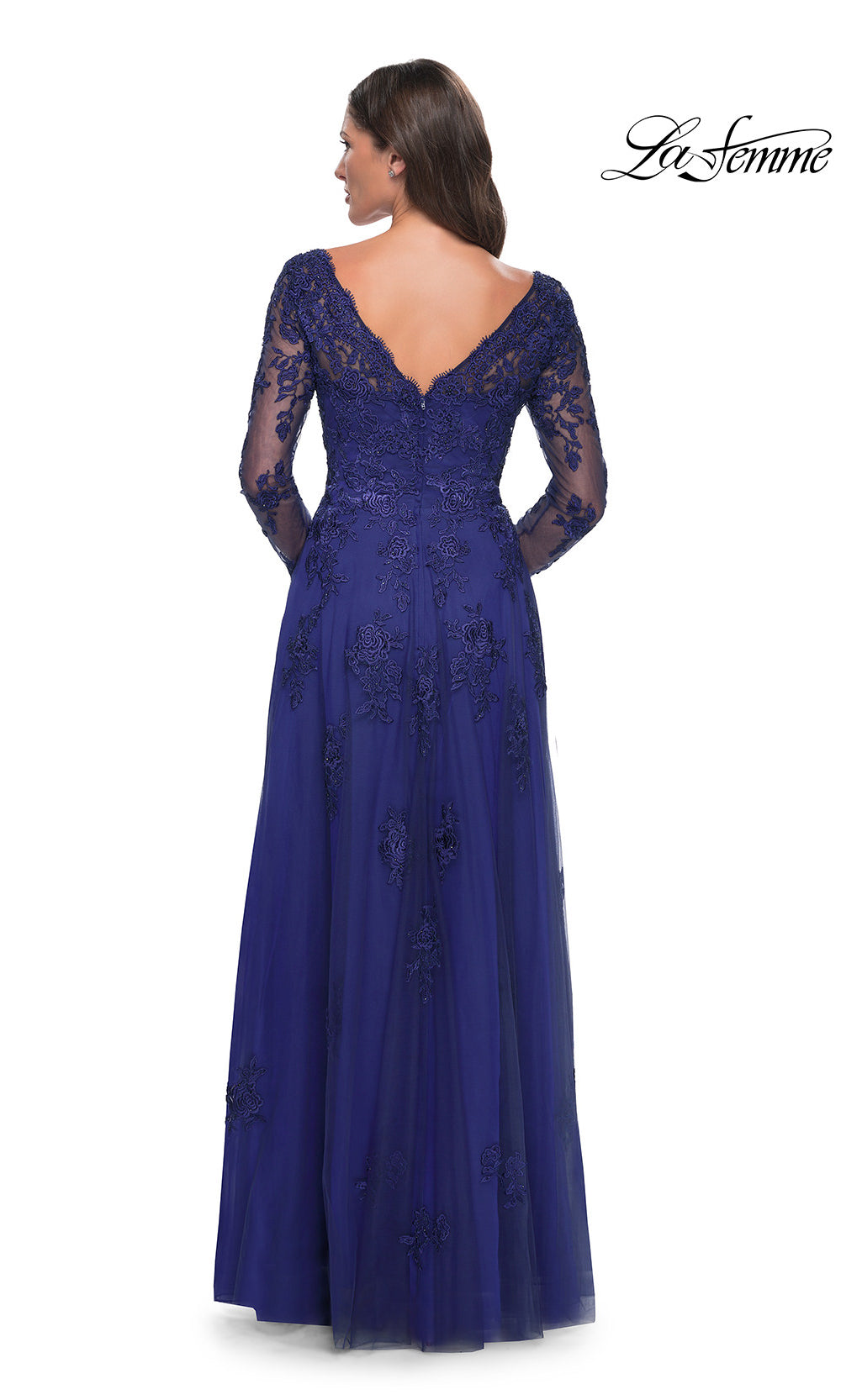 Navy blue evening gown with lace detailing on a white background