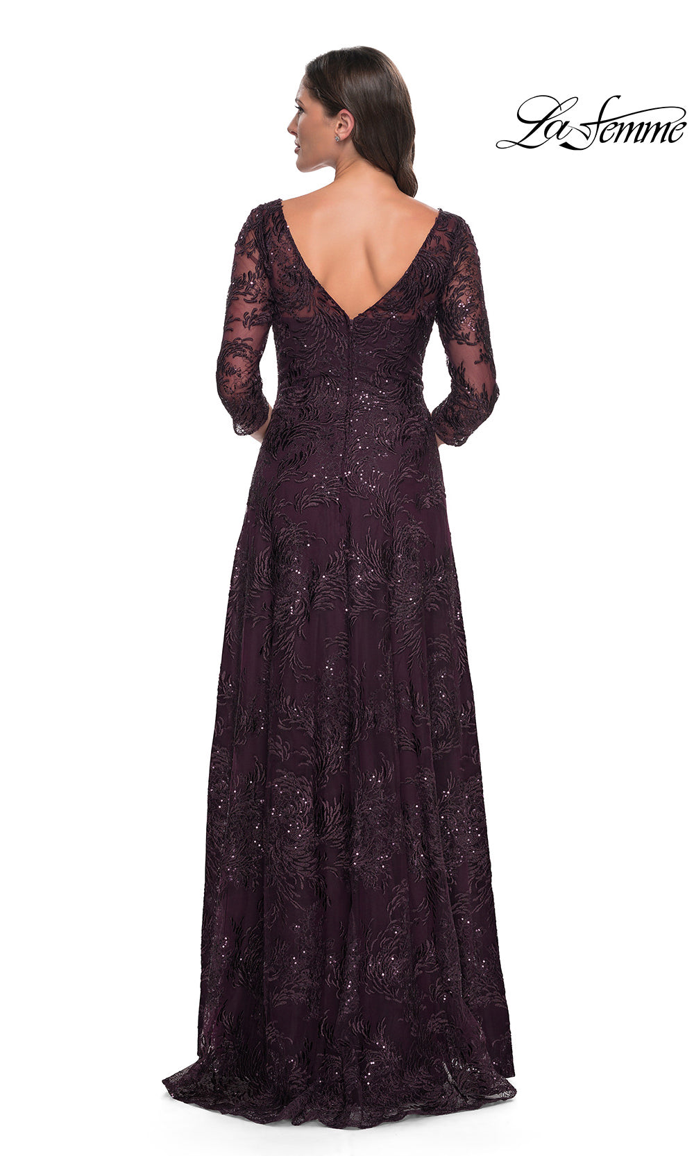 Elegant dark purple lace evening gown with long sleeves on a white background, featuring the brand 'La Femme'.