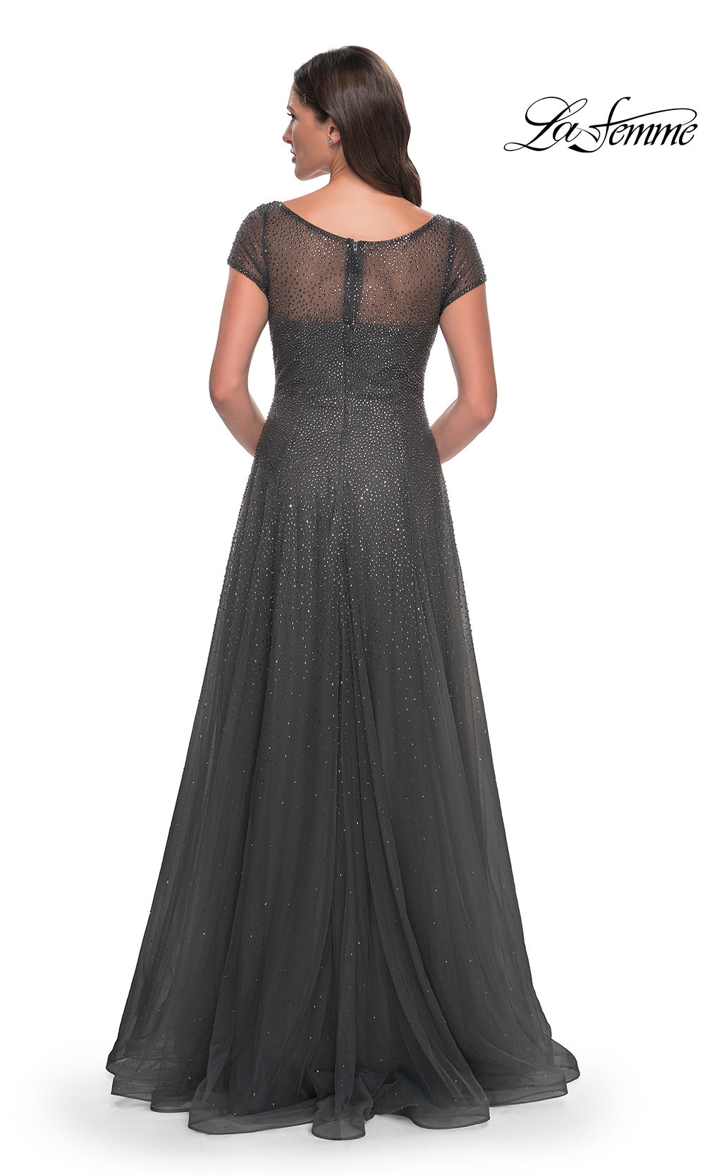 Black evening gown with sheer neckline on a white background