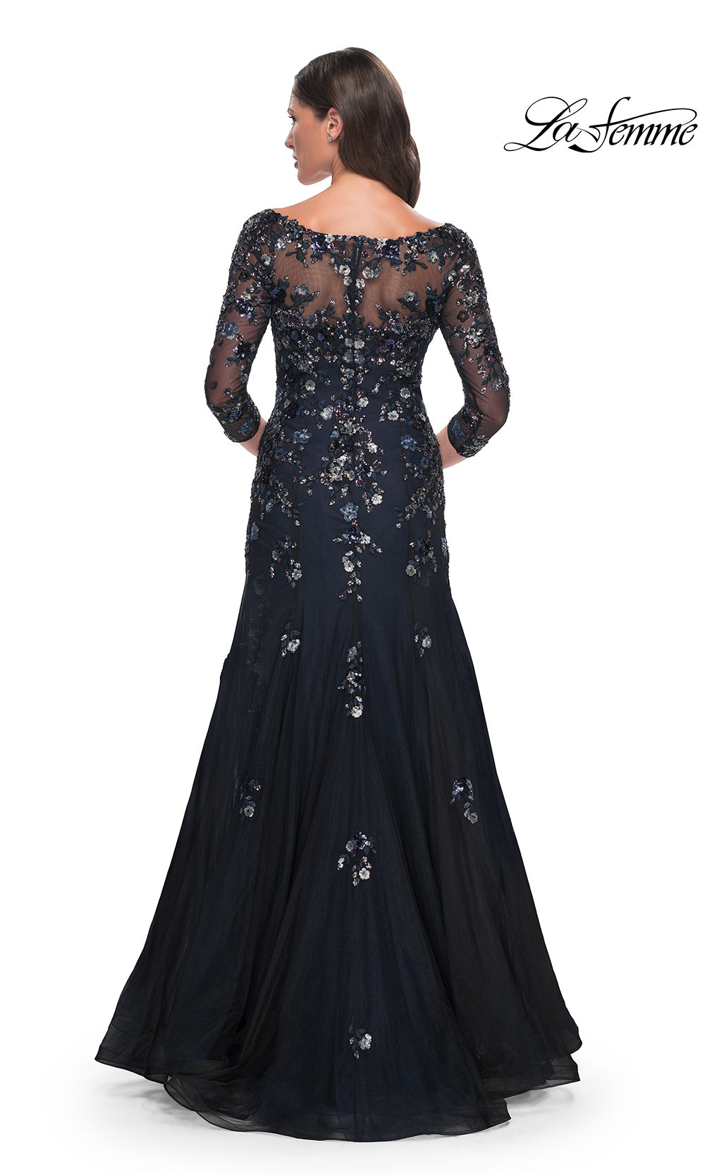 Navy blue evening gown with lace detailing on a white background