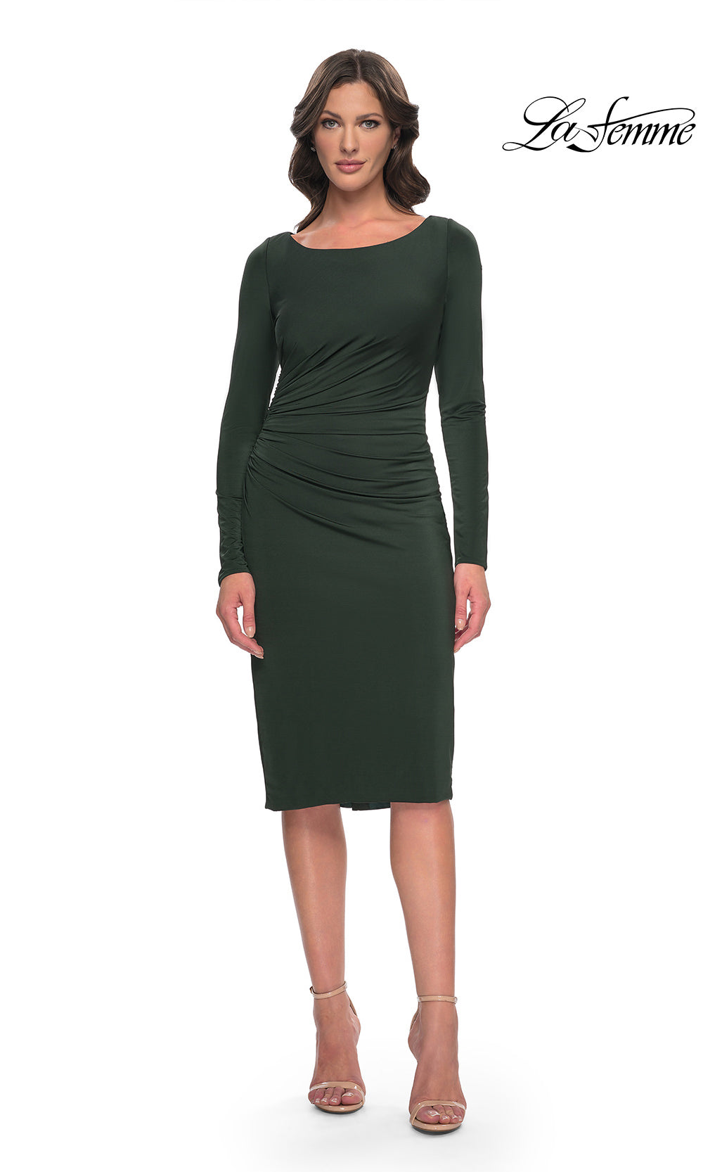 Woman wearing a green dress on a white background with 'La Femme' branding.