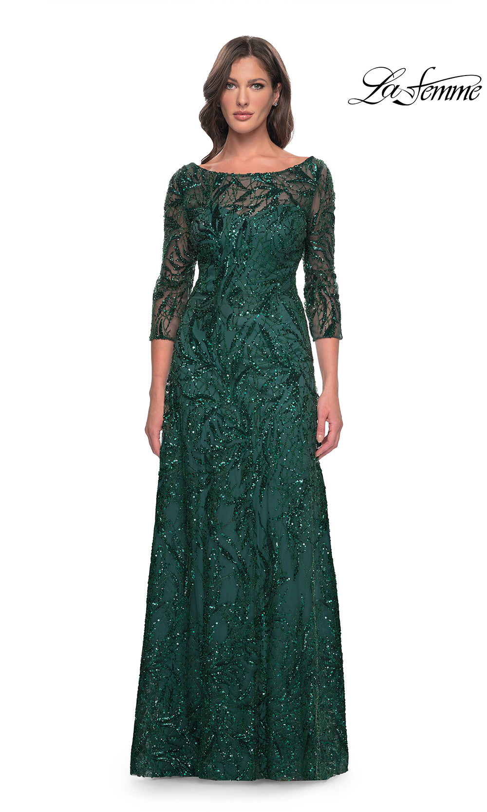 Green lace evening gown on a white background with 'La Femme' branding.