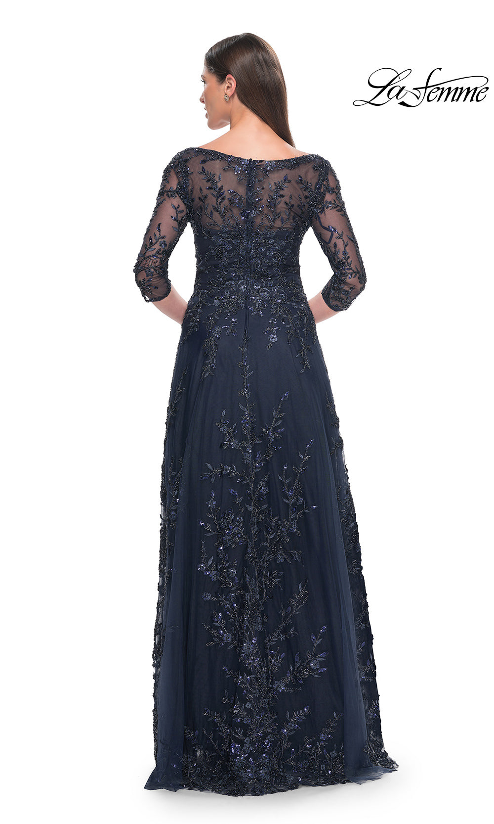Navy lace evening gown with long sleeves on a white background