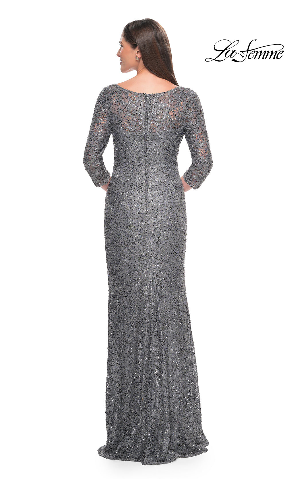Silver sequin evening gown with long sleeves on a white background
